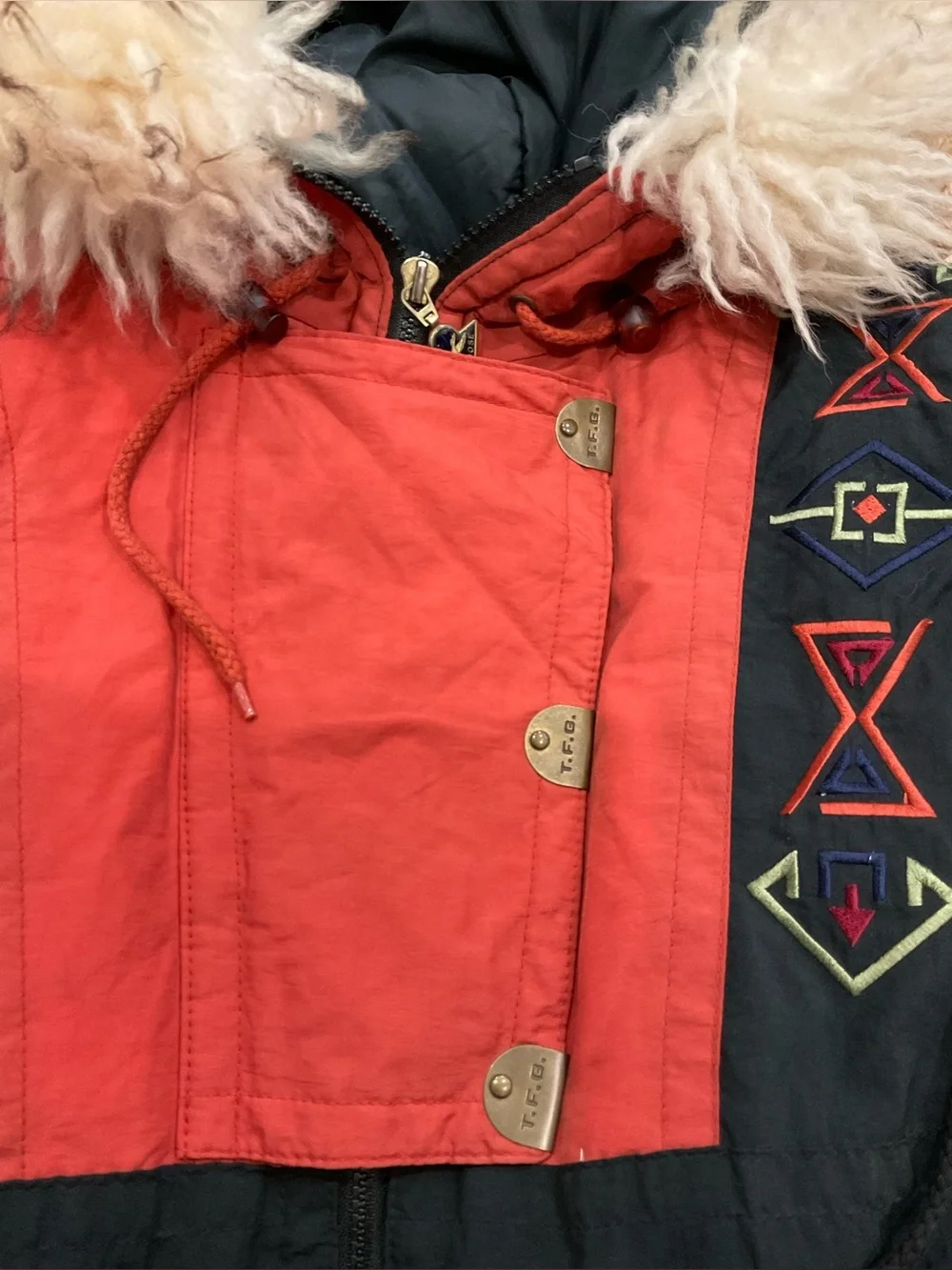 This vintage Triple F.A.T. Goose duck down ski parka features a striking.